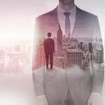 Businessman Overlooking Manhattan - Success and Achievement